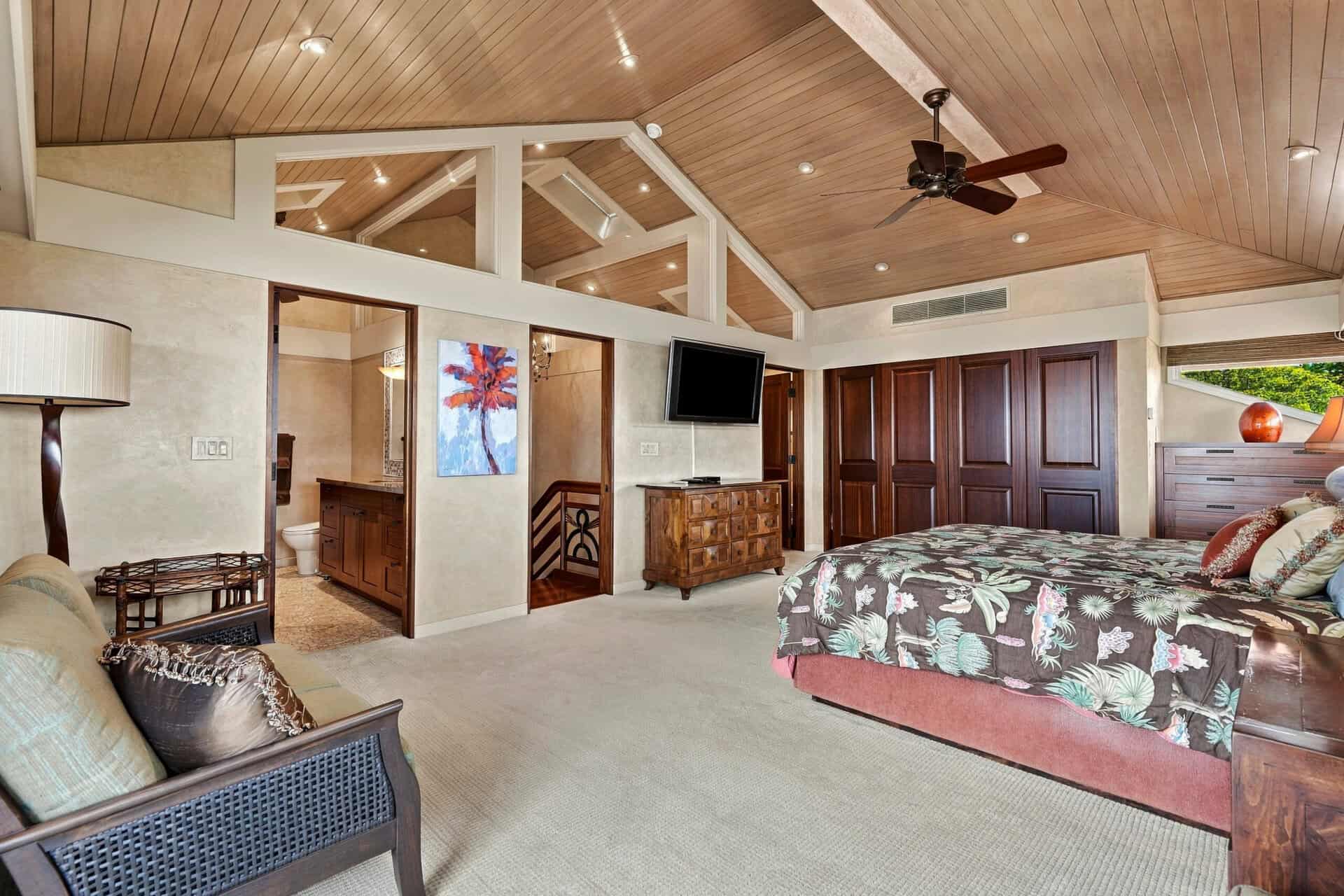 Primary suite of Residence 1104 with private lanai and ocean view